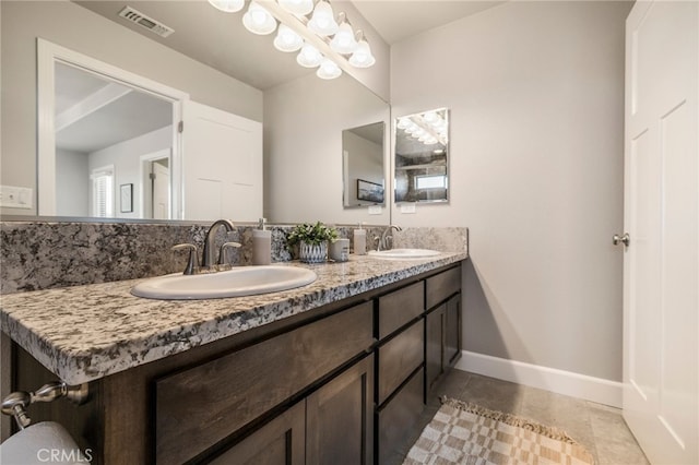 2740 Levi Ln, Chico, CA 95973 - bathroom with double vanity and tile patterned flooring
