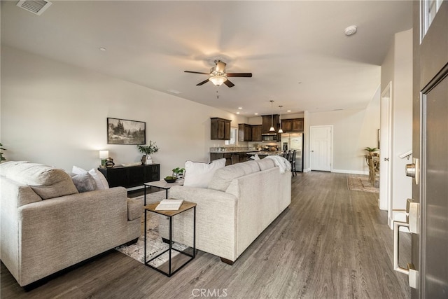 2740 Levi Ln, Chico, CA 95973 - living room with dark wood-style floors, a ceiling fan, and recessed lighting