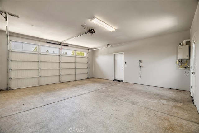 2740 Levi Ln, Chico, CA 95973 - garage with water heater and a garage door opener