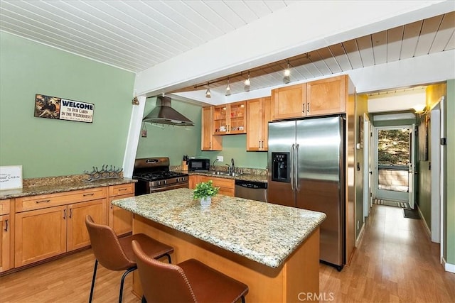 1351 Silverado Rd, Big Bear City, CA 92314 - kitchen with appliances with stainless steel finishes, wall chimney range hood, light wood-type flooring, light stone counters, and wood ceiling