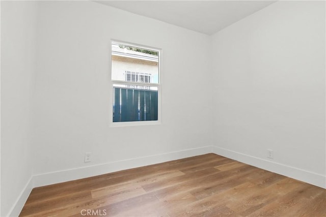 9525 Holmes Ave, Los Angeles, CA 90002 - spare room with light wood-style floors and baseboards