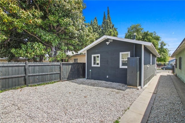9525 Holmes Ave, Los Angeles, CA 90002 - back of house featuring a fenced backyard