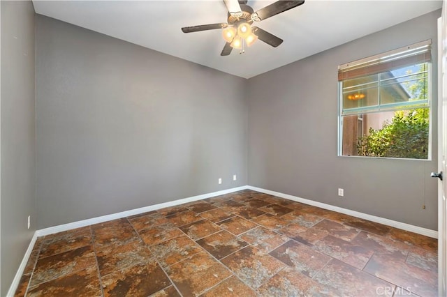 31139 Little Camille Way, Menifee, CA 92584 - spare room featuring dark stone finish floors and ceiling fan
