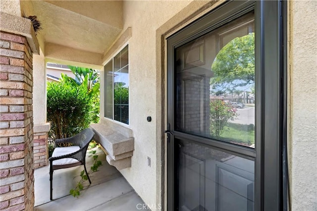 31139 Little Camille Way, Menifee, CA 92584 - property entrance featuring stucco siding