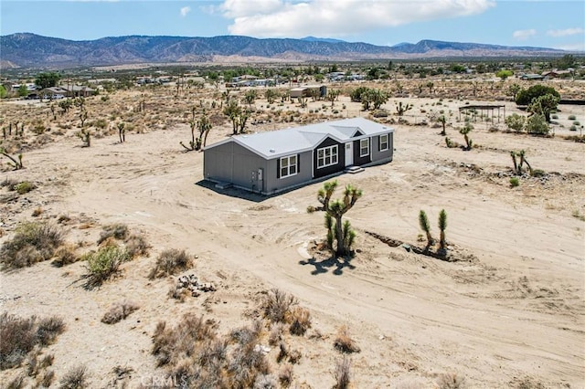 537 Calaveras Rd, Pinon Hills, CA 92372 - aerial view of sparsely populated area with a mountain backdrop