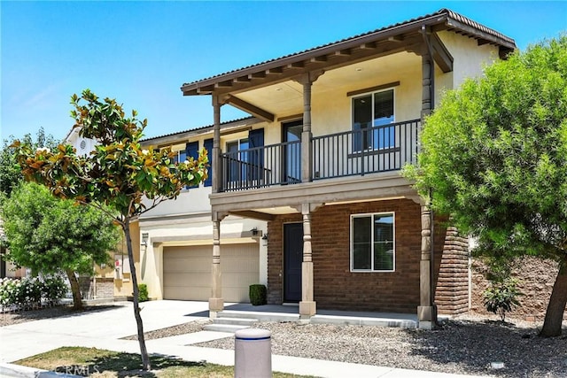 6212 Athena St, Chino, CA 91710 - view of front of property featuring a balcony, driveway, stucco siding, and a garage