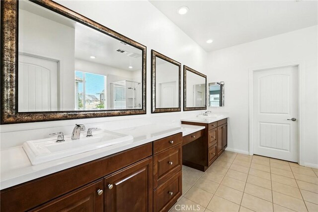 6212 Athena St, Chino, CA 91710 - bathroom with vanity, tile patterned floors, a stall shower, and recessed lighting