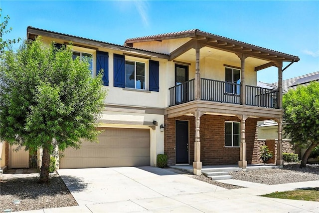 6212 Athena St, Chino, CA 91710 - view of front of property with a balcony, an attached garage, covered porch, driveway, and stucco siding