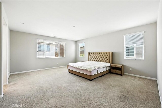 6212 Athena St, Chino, CA 91710 - carpeted bedroom featuring baseboards