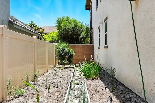 6212 Athena St, Chino, CA 91710 - fenced backyard featuring a garden