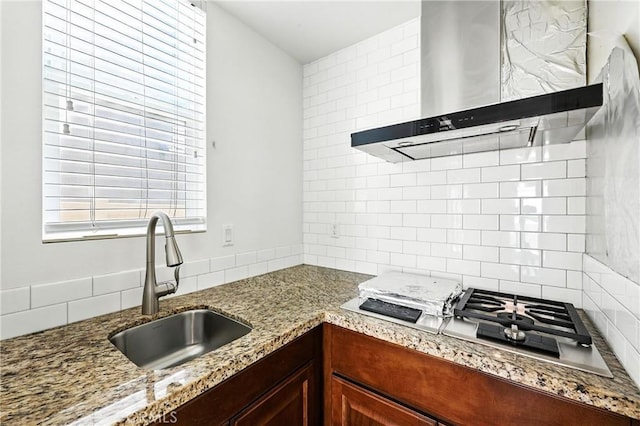 6212 Athena St, Chino, CA 91710 - kitchen featuring wall chimney exhaust hood, tasteful backsplash, stainless steel gas cooktop, light stone countertops, and open shelves