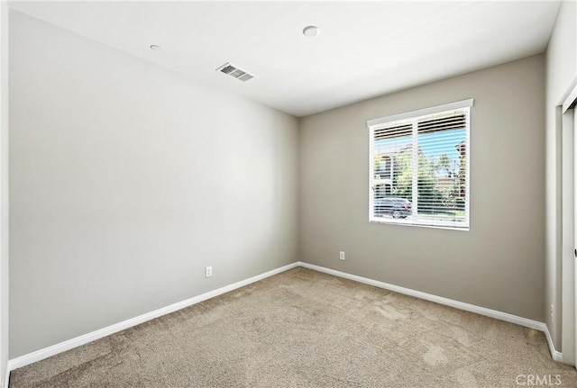 6212 Athena St, Chino, CA 91710 - empty room featuring light colored carpet and baseboards