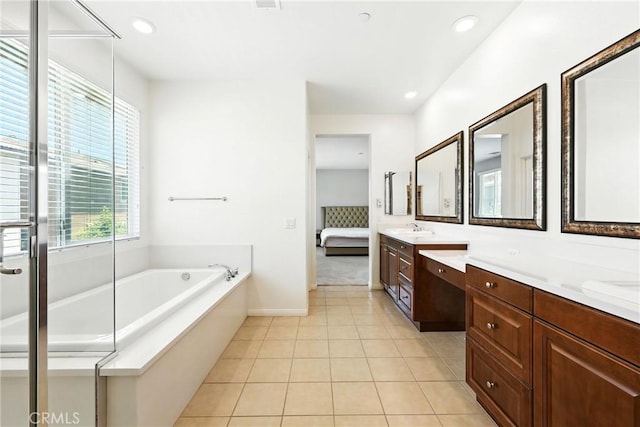 6212 Athena St, Chino, CA 91710 - ensuite bathroom featuring double vanity, a bath, tile patterned flooring, and recessed lighting