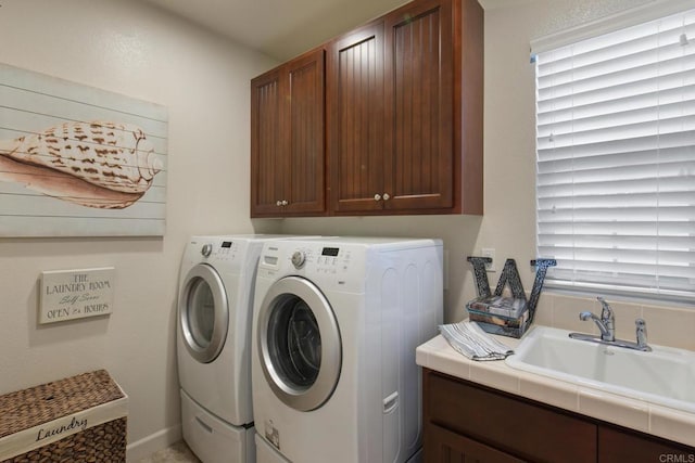 674 Calypso Pl, Encinitas, CA 92024 - washroom with cabinet space and washing machine and dryer