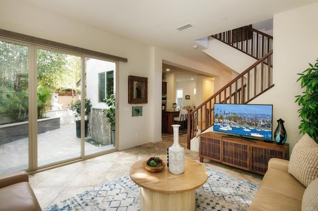 674 Calypso Pl, Encinitas, CA 92024 - tiled living area featuring stairway and baseboards