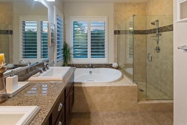 674 Calypso Pl, Encinitas, CA 92024 - bathroom with a bath, double vanity, a shower stall, and tile patterned flooring