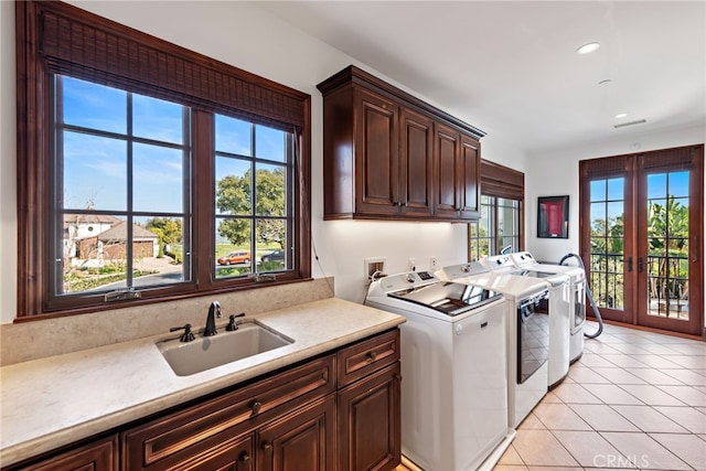 1 Overlook Dr, Ladera Ranch, CA 92694 - washroom featuring cabinet space, separate washer and dryer, recessed lighting, and light tile patterned floors