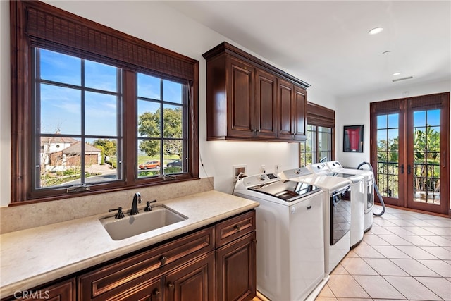 1 Overlook Dr, Ladera Ranch, CA 92694 - laundry room featuring cabinet space, washer and dryer, recessed lighting, and light tile patterned flooring