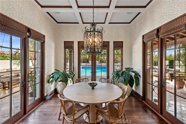 1 Overlook Dr, Ladera Ranch, CA 92694 - dining room featuring french doors, dark wood-type flooring, a chandelier, coffered ceiling, and beamed ceiling