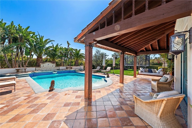 1 Overlook Dr, Ladera Ranch, CA 92694 - view of swimming pool featuring a patio area, a fenced backyard, and an outdoor living space