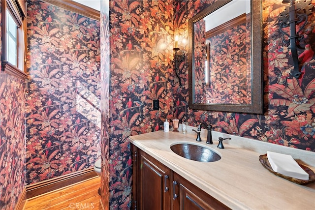 1 Overlook Dr, Ladera Ranch, CA 92694 - bathroom featuring wallpapered walls, vanity, and wood finished floors