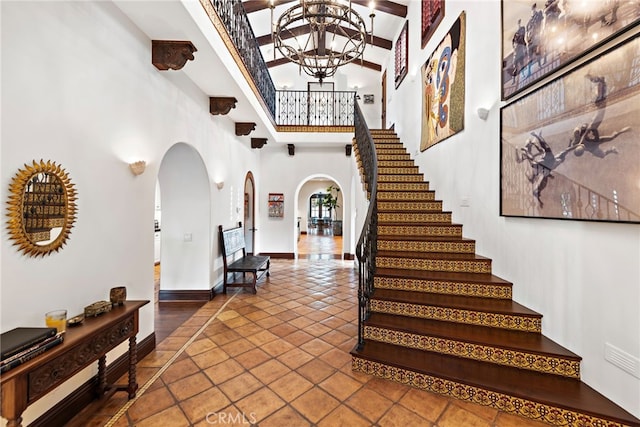 1 Overlook Dr, Ladera Ranch, CA 92694 - stairway with arched walkways, high vaulted ceiling, and tile patterned floors