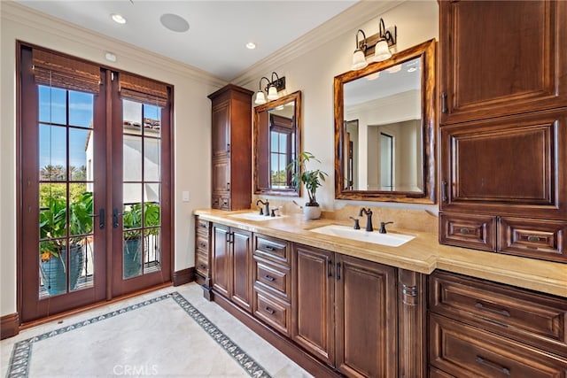 1 Overlook Dr, Ladera Ranch, CA 92694 - bathroom featuring french doors, double vanity, crown molding, inlaid floor details, and recessed lighting
