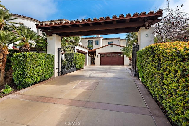 1 Overlook Dr, Ladera Ranch, CA 92694 - view of parking / parking lot with a garage, a gate, and driveway