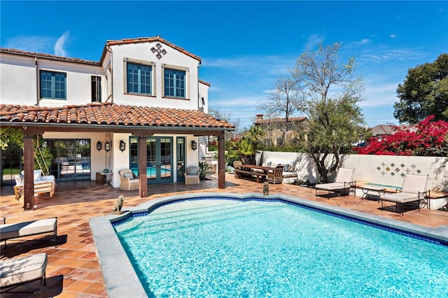 1 Overlook Dr, Ladera Ranch, CA 92694 - back of house featuring french doors, a patio, and stucco siding