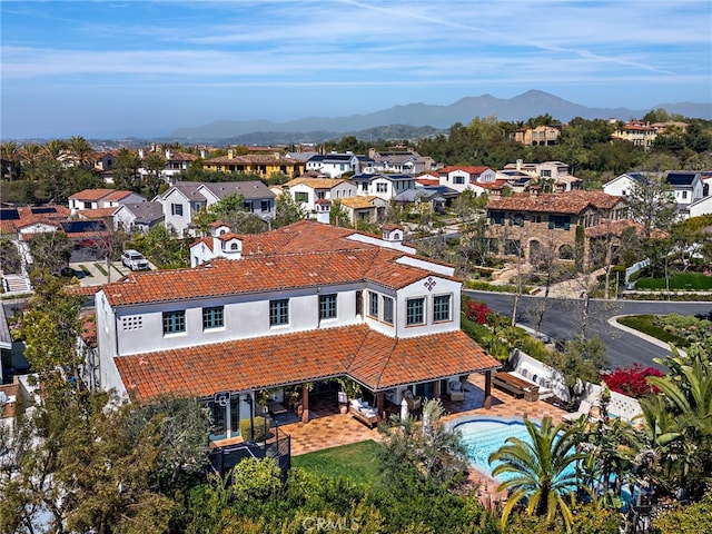 1 Overlook Dr, Ladera Ranch, CA 92694 - aerial view of residential area with a mountain backdrop and a pool area