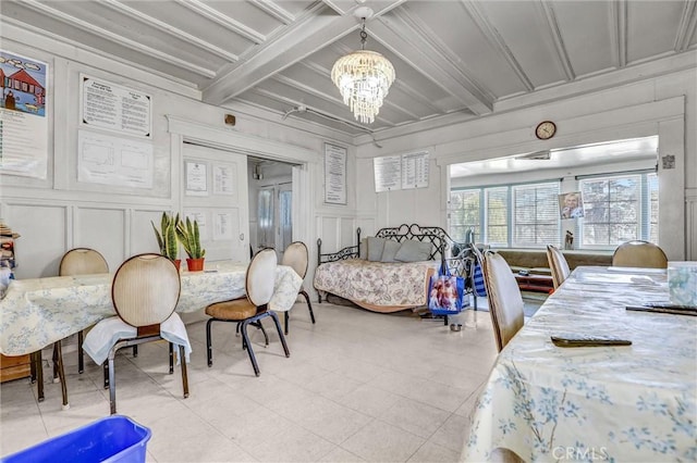 1470 W Adams Blvd, Los Angeles, CA 90007 - bedroom featuring a decorative wall, a chandelier, beam ceiling, coffered ceiling, and a closet