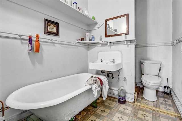 1470 W Adams Blvd, Los Angeles, CA 90007 - full bathroom with a freestanding bath and tile patterned floors