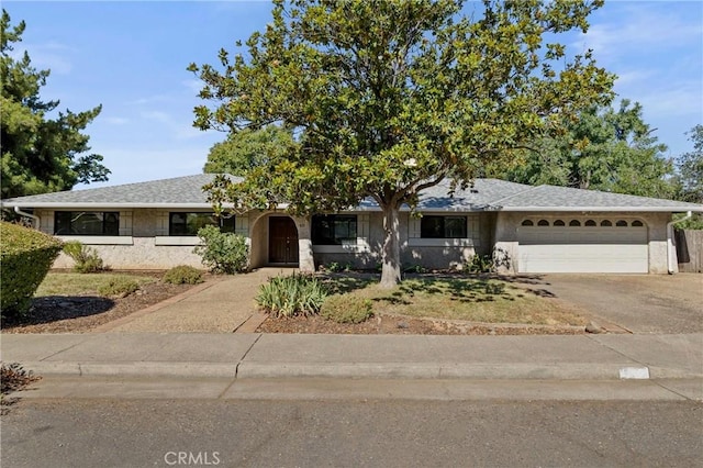 835 Madrone Ave, Chico, CA 95926 - view of front of home featuring asphalt driveway and a garage
