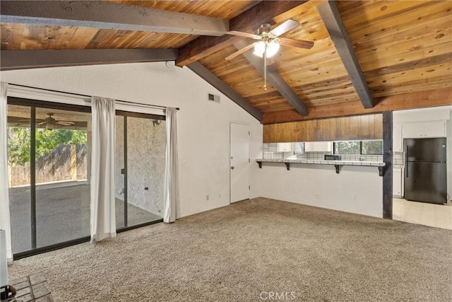 835 Madrone Ave, Chico, CA 95926 - unfurnished living room featuring a ceiling fan, wood ceiling, and light colored carpet
