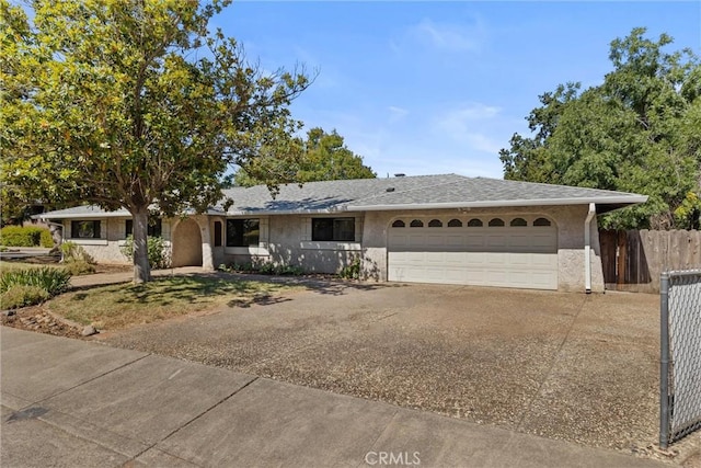 835 Madrone Ave, Chico, CA 95926 - single story home with driveway, a garage, and stucco siding