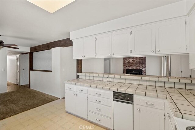 835 Madrone Ave, Chico, CA 95926 - kitchen featuring light flooring, tile counters, and white cabinets