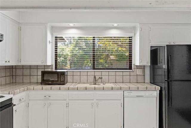 835 Madrone Ave, Chico, CA 95926 - kitchen featuring black appliances, tile counters, white cabinets, tasteful backsplash, and recessed lighting
