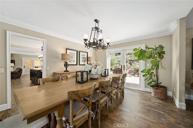 33612 Vino Way, Temecula, CA 92591 - dining room featuring a chandelier, ornamental molding, and dark wood-type flooring