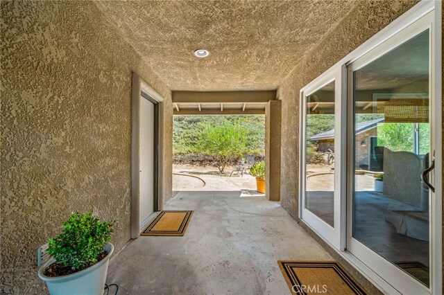 33612 Vino Way, Temecula, CA 92591 - doorway with concrete floors