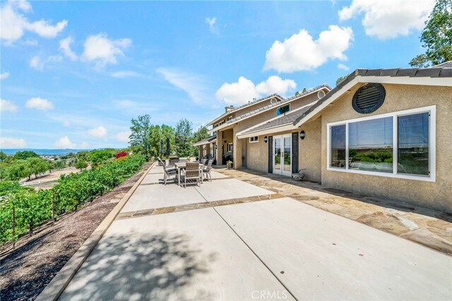 33612 Vino Way, Temecula, CA 92591 - view of patio / terrace featuring outdoor dining area and french doors