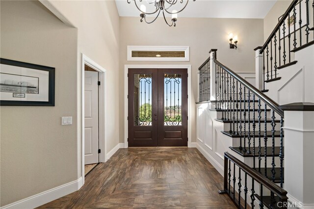 33612 Vino Way, Temecula, CA 92591 - foyer entrance with french doors, a chandelier, stairway, and a high ceiling