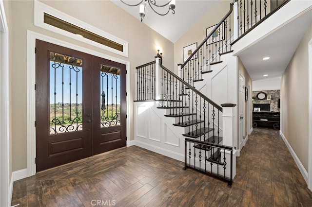 33612 Vino Way, Temecula, CA 92591 - foyer entrance featuring french doors, stairs, a chandelier, and a towering ceiling