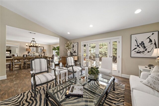 33612 Vino Way, Temecula, CA 92591 - living room with healthy amount of natural light, dark wood-type flooring, vaulted ceiling, a chandelier, and recessed lighting