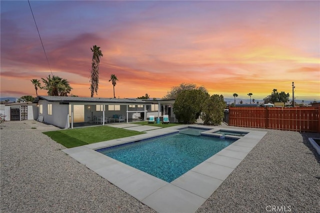 845 W Gateway Dr, Palm Springs, CA 92262 - view of swimming pool with a patio, a fenced backyard, and a pool with connected hot tub