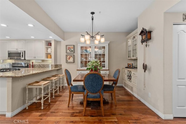 239 Via Presa, San Clemente, CA 92672 - dining room with a chandelier, wood finished floors, and recessed lighting