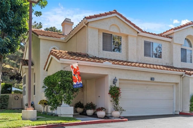 239 Via Presa, San Clemente, CA 92672 - view of front of house with a garage, a tiled roof, and stucco siding