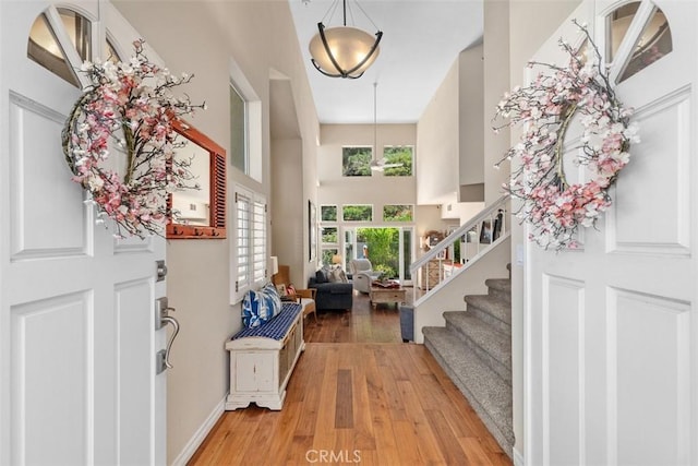 239 Via Presa, San Clemente, CA 92672 - foyer featuring stairs, wood-type flooring, and a high ceiling