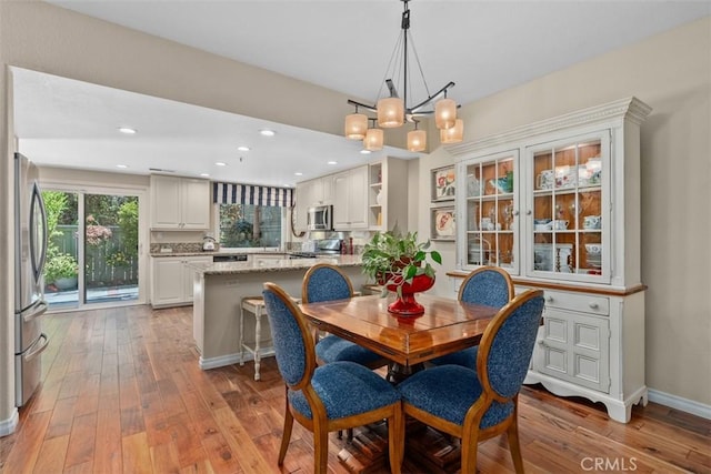 239 Via Presa, San Clemente, CA 92672 - dining room with a chandelier, wood-type flooring, and recessed lighting