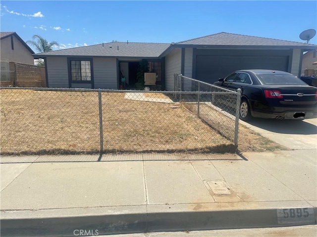 5895 Cynthia St, San Bernardino, CA 92407 - single story home featuring a garage and concrete driveway