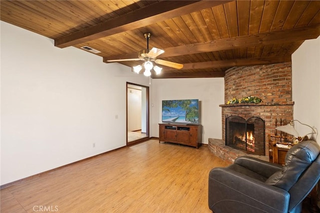 41050 Mesa Robles Cir, Temecula, CA 92592 - living room featuring light wood-style flooring, a wooden ceiling with exposed beams, a fireplace, and ceiling fan